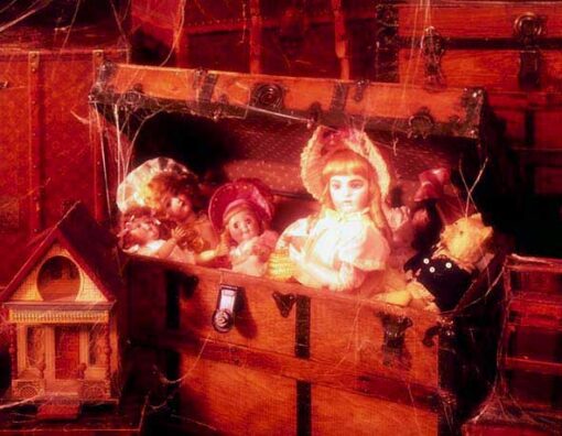 A painting of a chest full of dolls