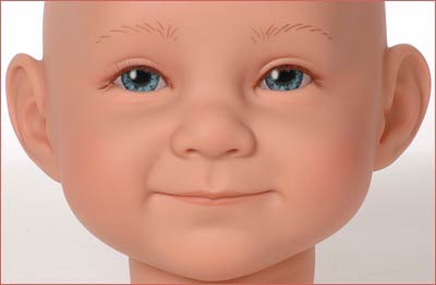 A close up of the face of a baby