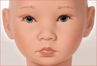 A close up of the face of a baby