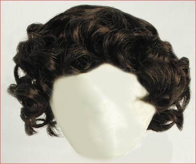 A wig is shown with hair in it.