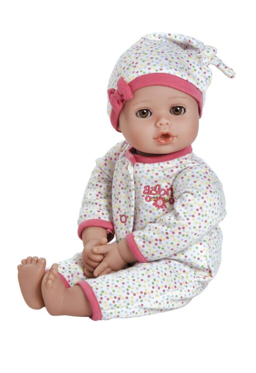A baby doll wearing pajamas and hat