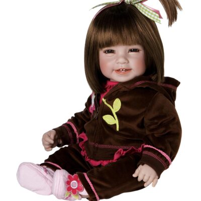 A doll that is sitting down and wearing a brown outfit.