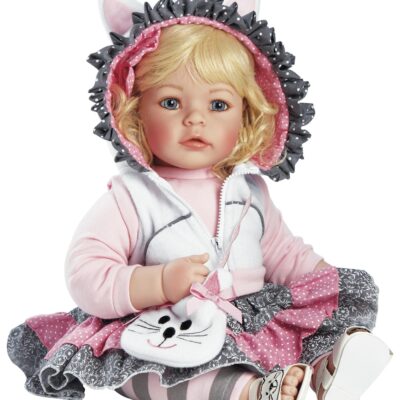 A doll wearing a pink and white outfit.